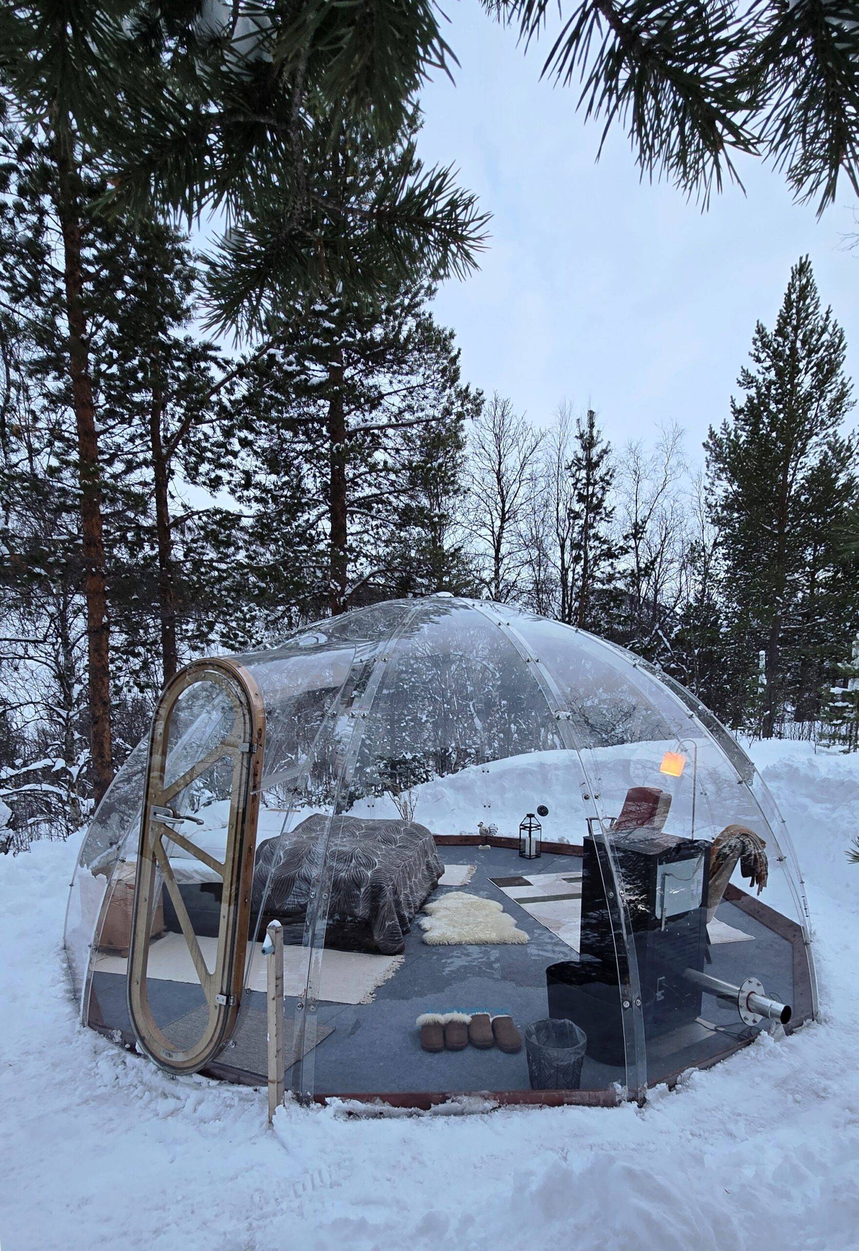 transparent glass igloo in the day time